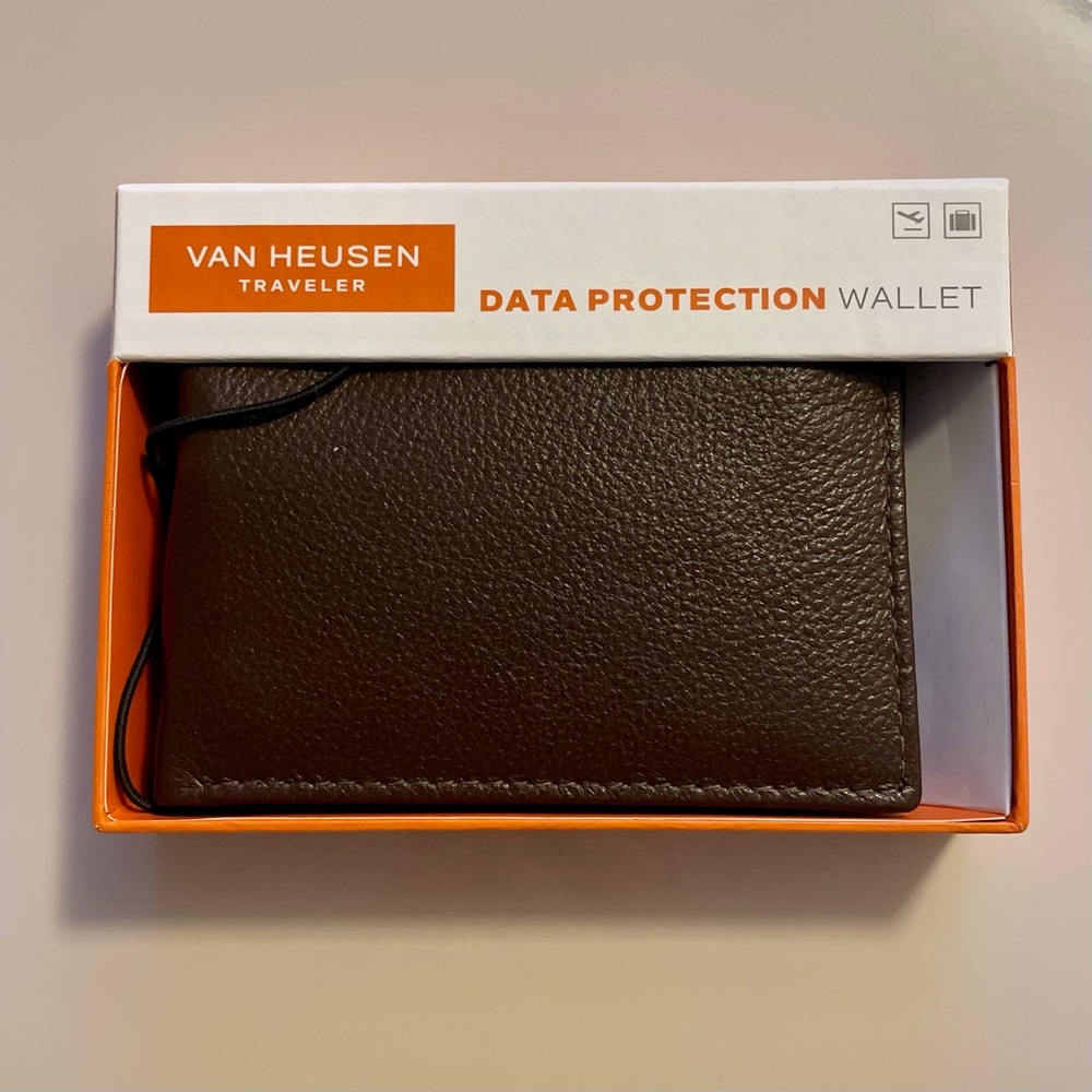 Brand new Van Huesen wallet w/RFID blocker.